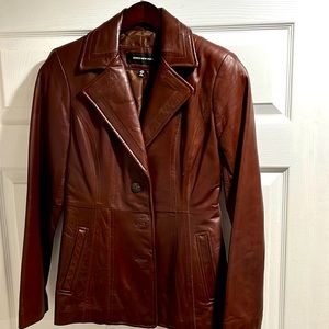 Brown leather blazer.